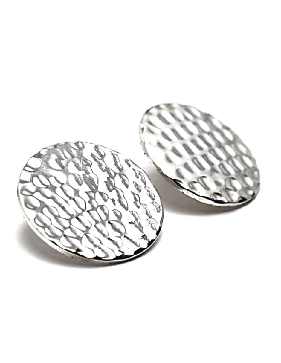 Broqueles redondos de plata con acabado brillante