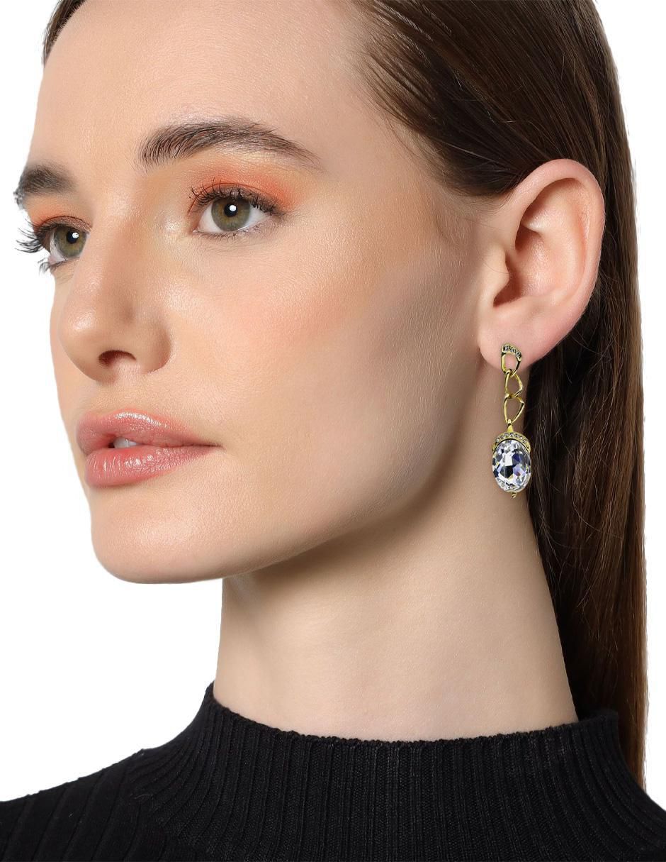 Aretes ovalados con acabado baño de oro cristal 4