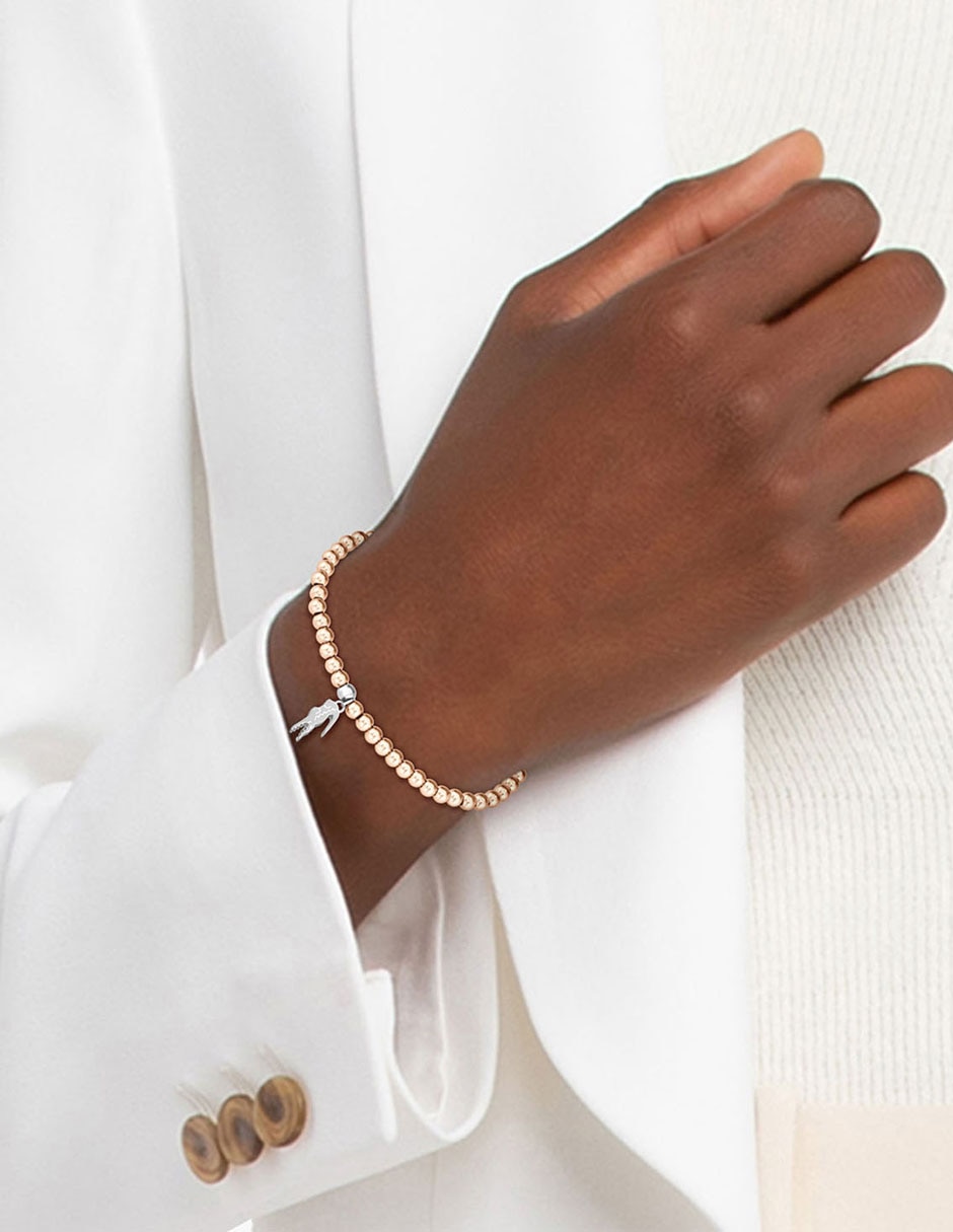 Brazalete Lacoste Orbe con acabado brillante