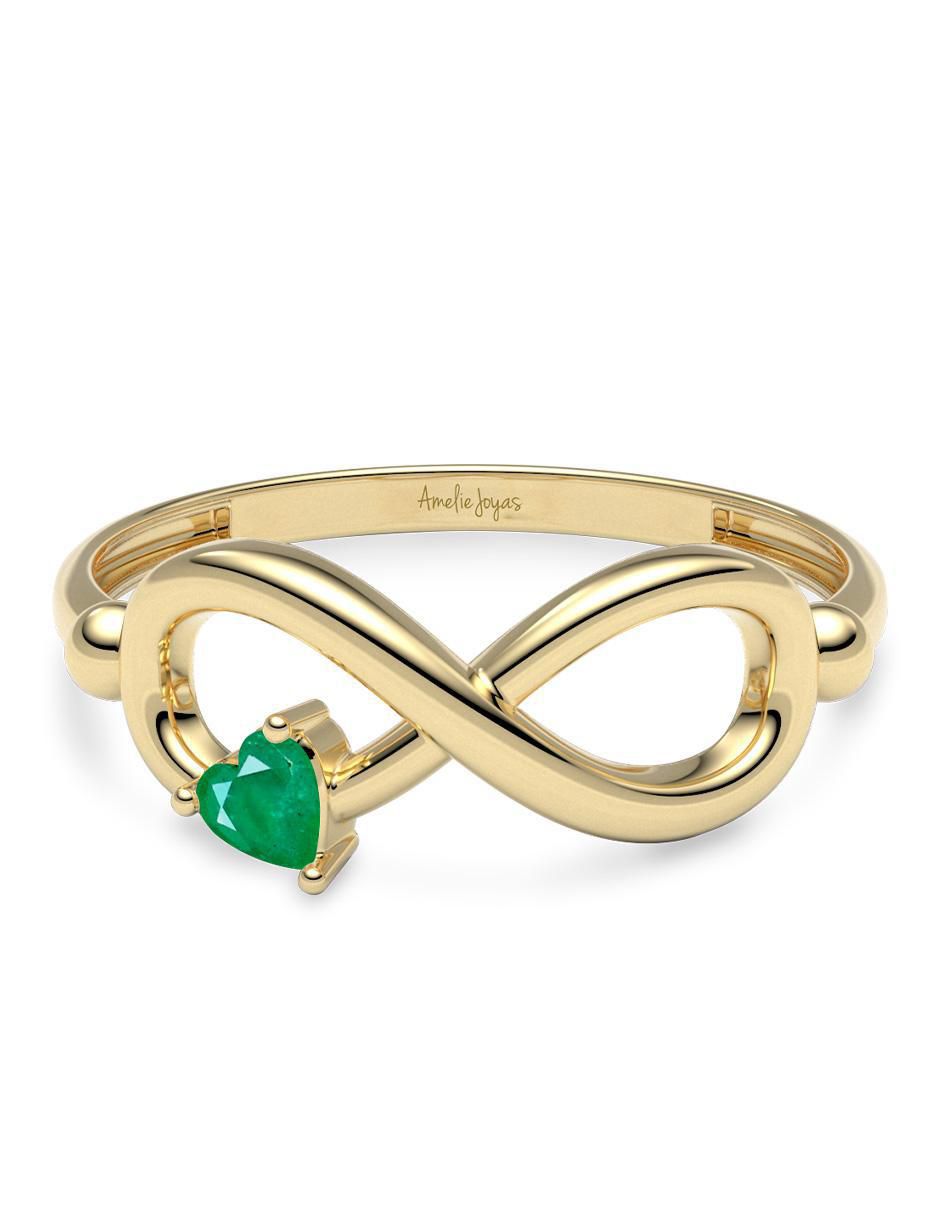 Anillo de infinito de oro esmeralda brillante