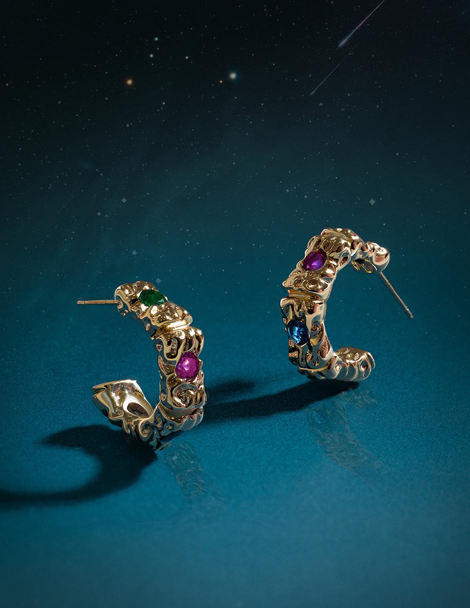 Aretes redondos con acabado baño de oro 18 K 4