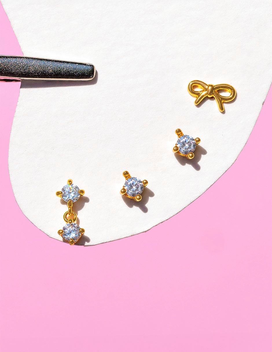 Aretes de moño 18 K con acabado chapa de oro 2