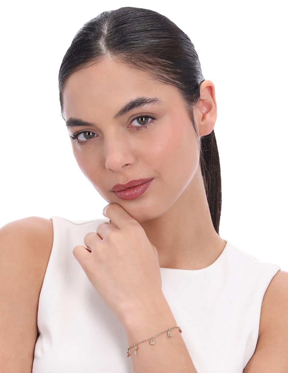 Pulsera Coach 12.1 Charming Charms con acabado brillante