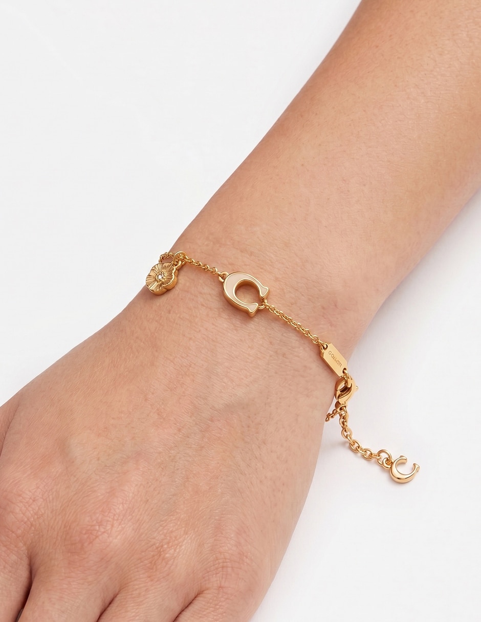Pulsera coach de latón coaug25mrkt3 con acabado liso