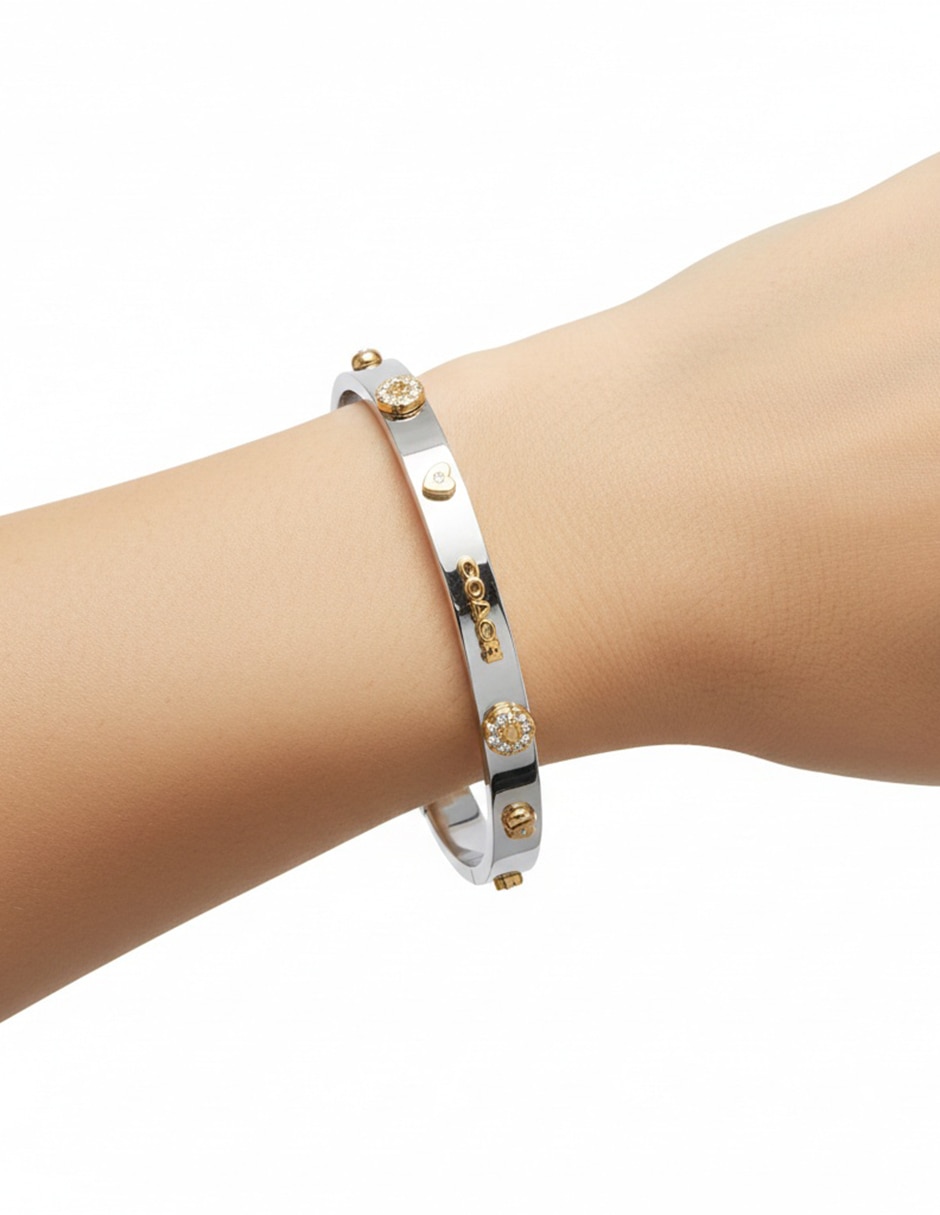 Pulsera Coach con acabado pulido