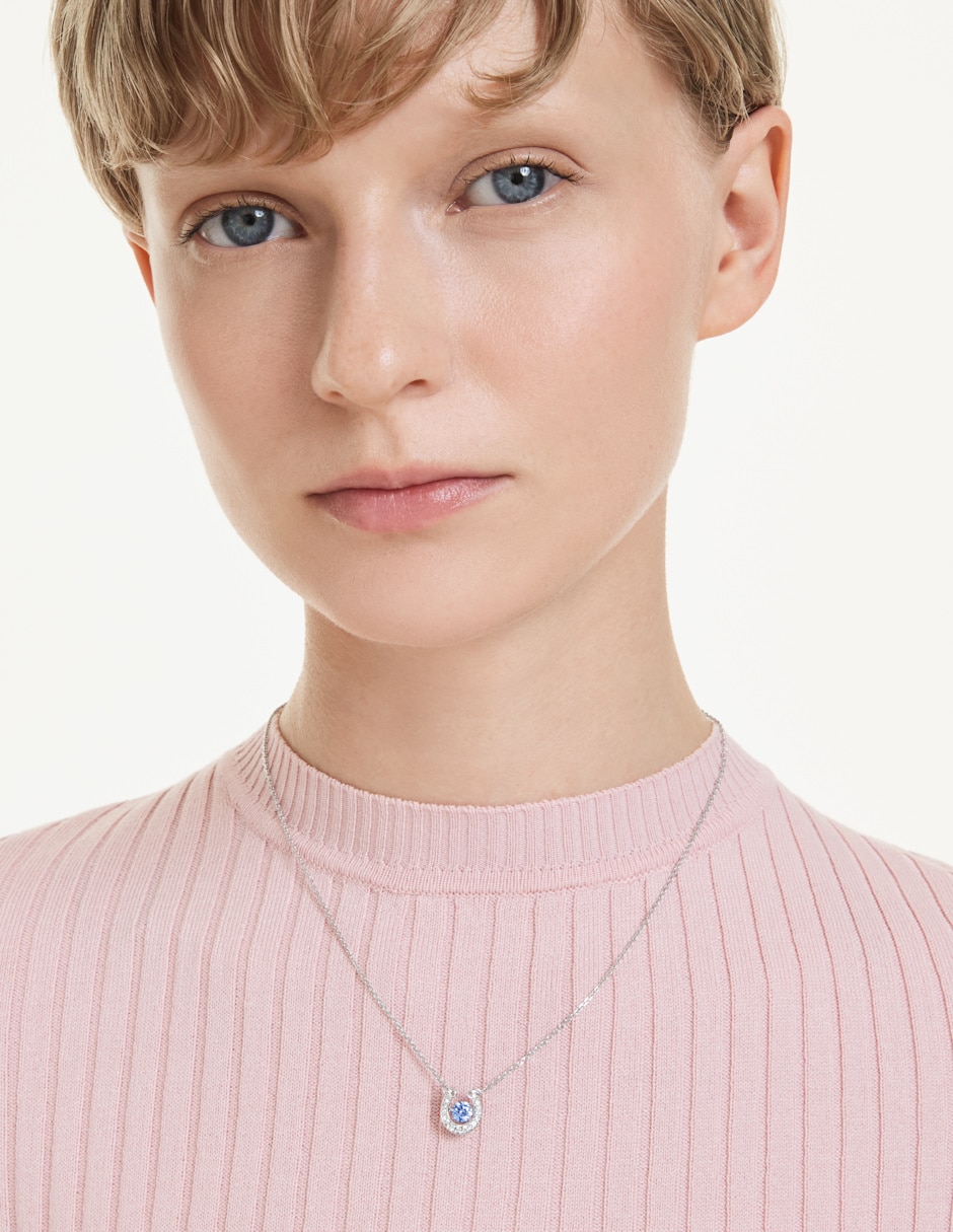 Collar herradura symbolica