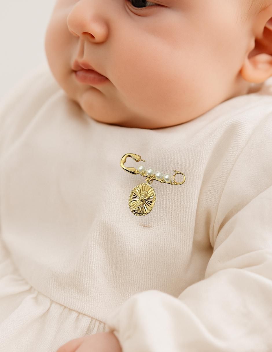 Dije de forma ovalada Mancini 14 K