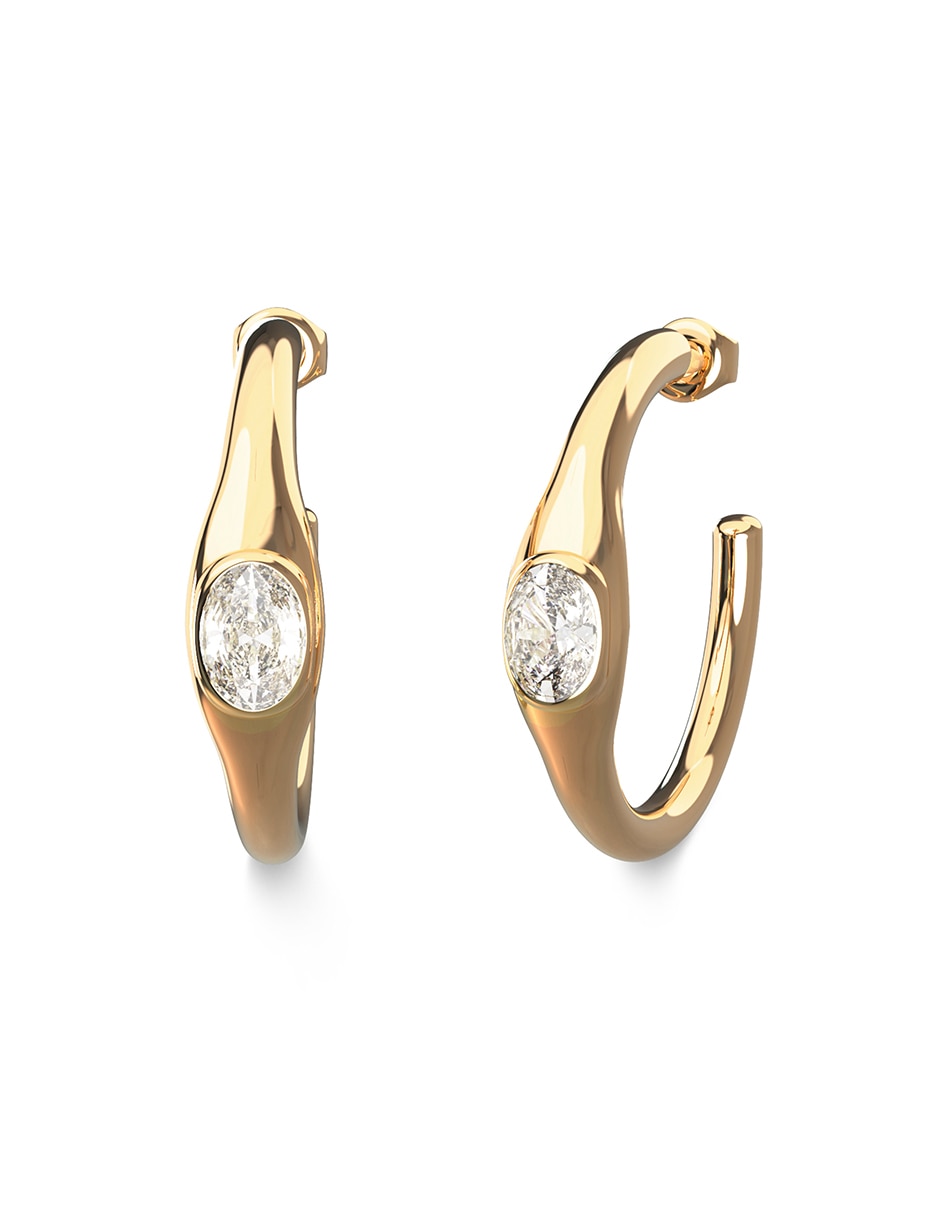 Aretes huggies de letra g divine con acabado brillante cristal 1