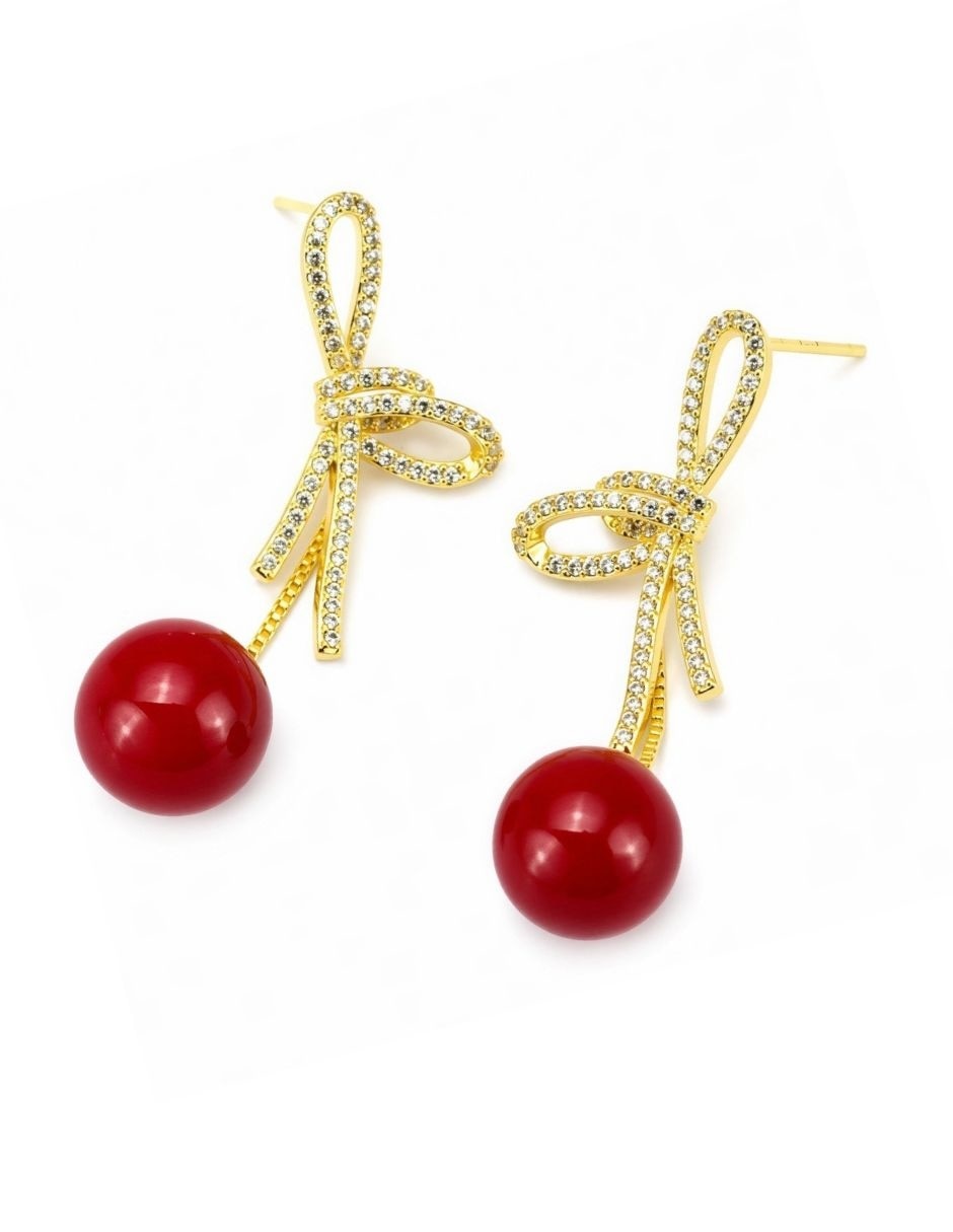 Aretes largos cerise con acabado baño de oro zirconia 2